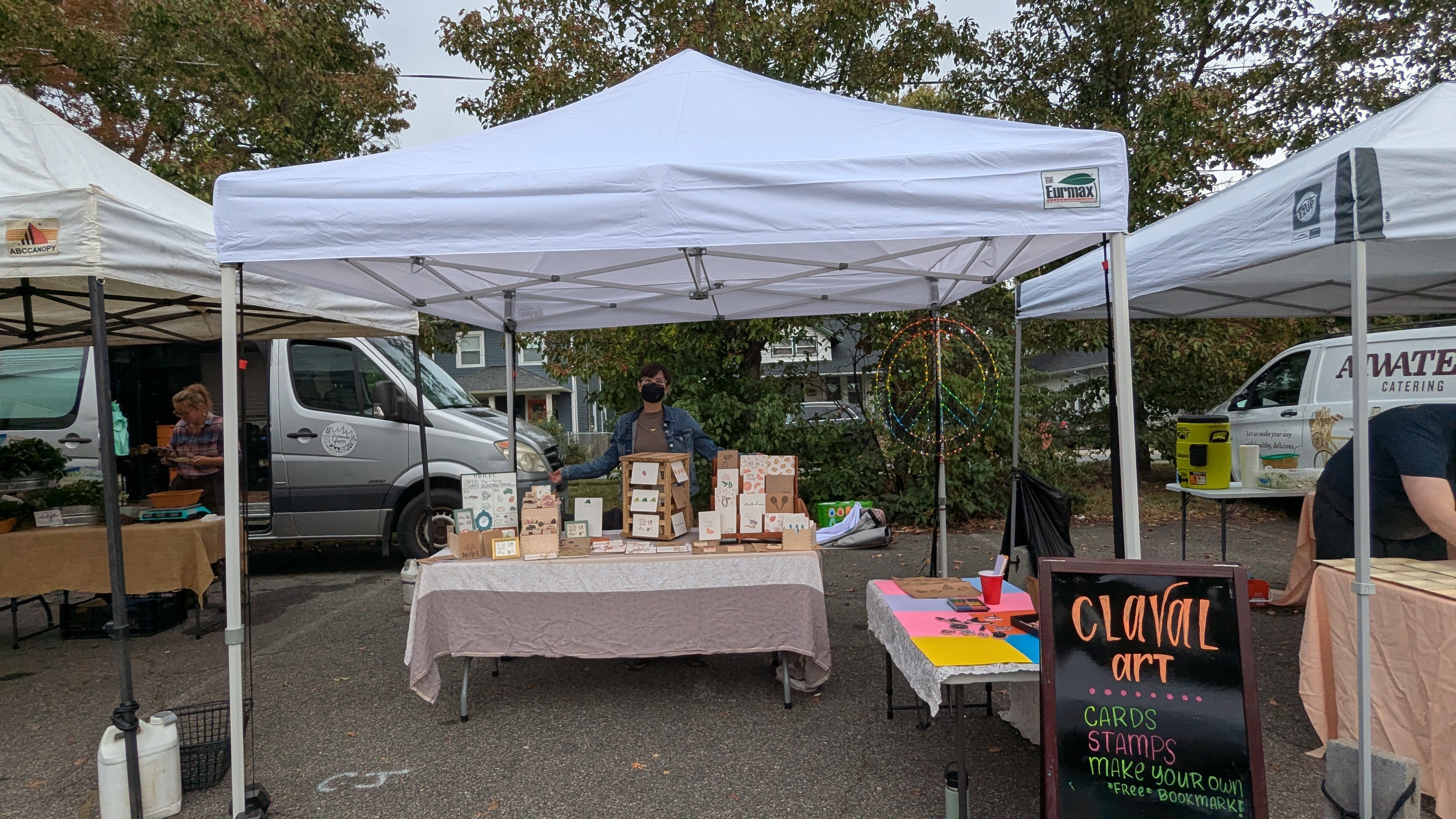 Claire vending at a farmer's market
